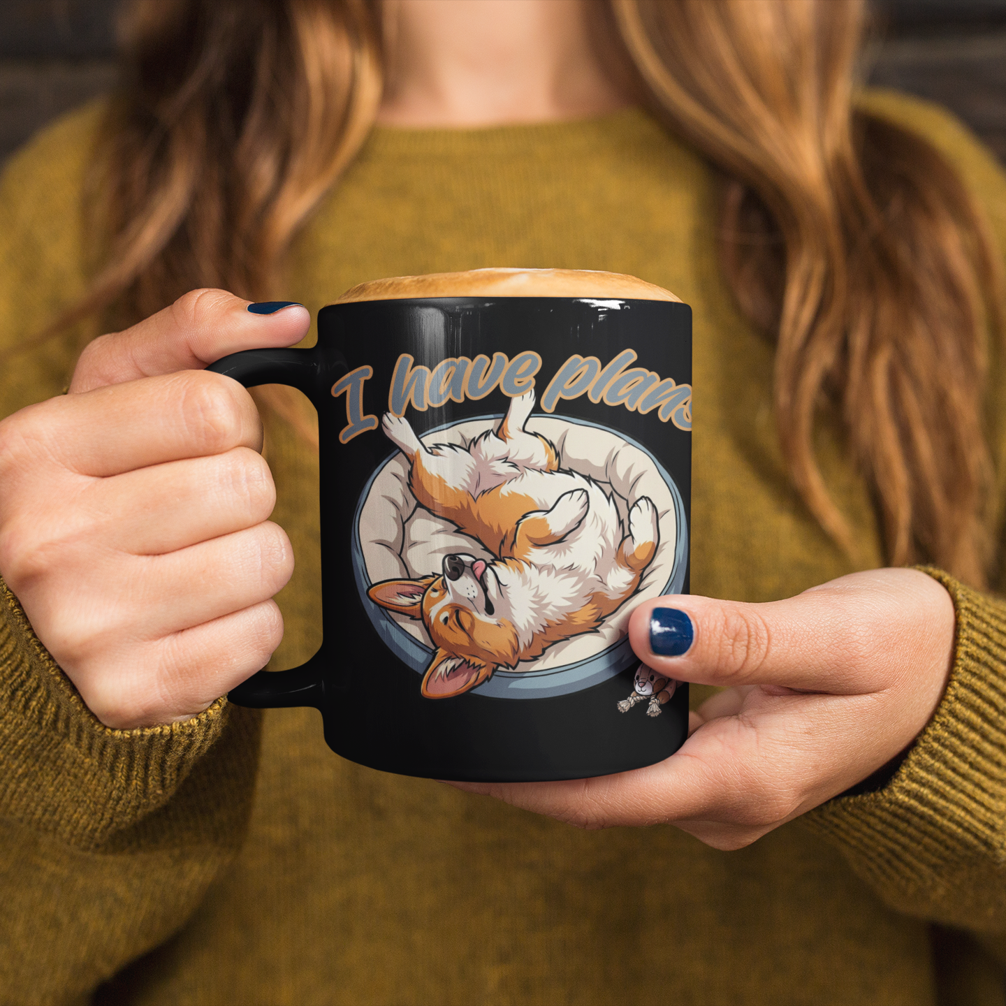 Person holding a mug with a dog design and text 'I love pugs' against a blurred background